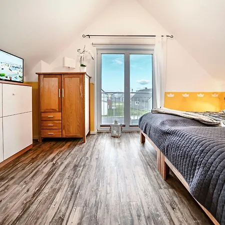 Ferienhaus-lieblingsplatz-by-seeblick-ferien-oro-direkte-wasserlage-sauna بيت للعطل *